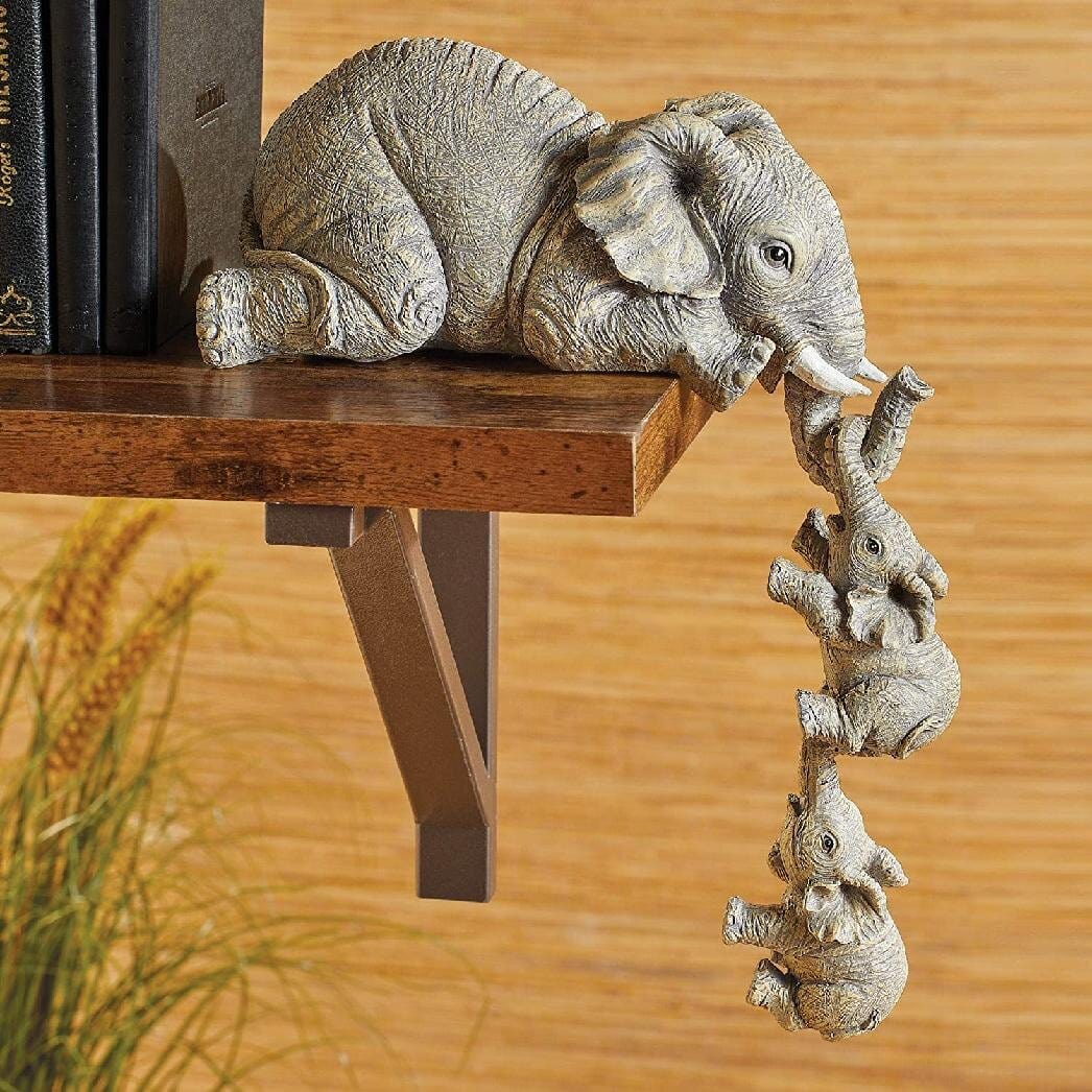 wickedafstore 0 Elephant Mom Hanging Off The Edge Figurine